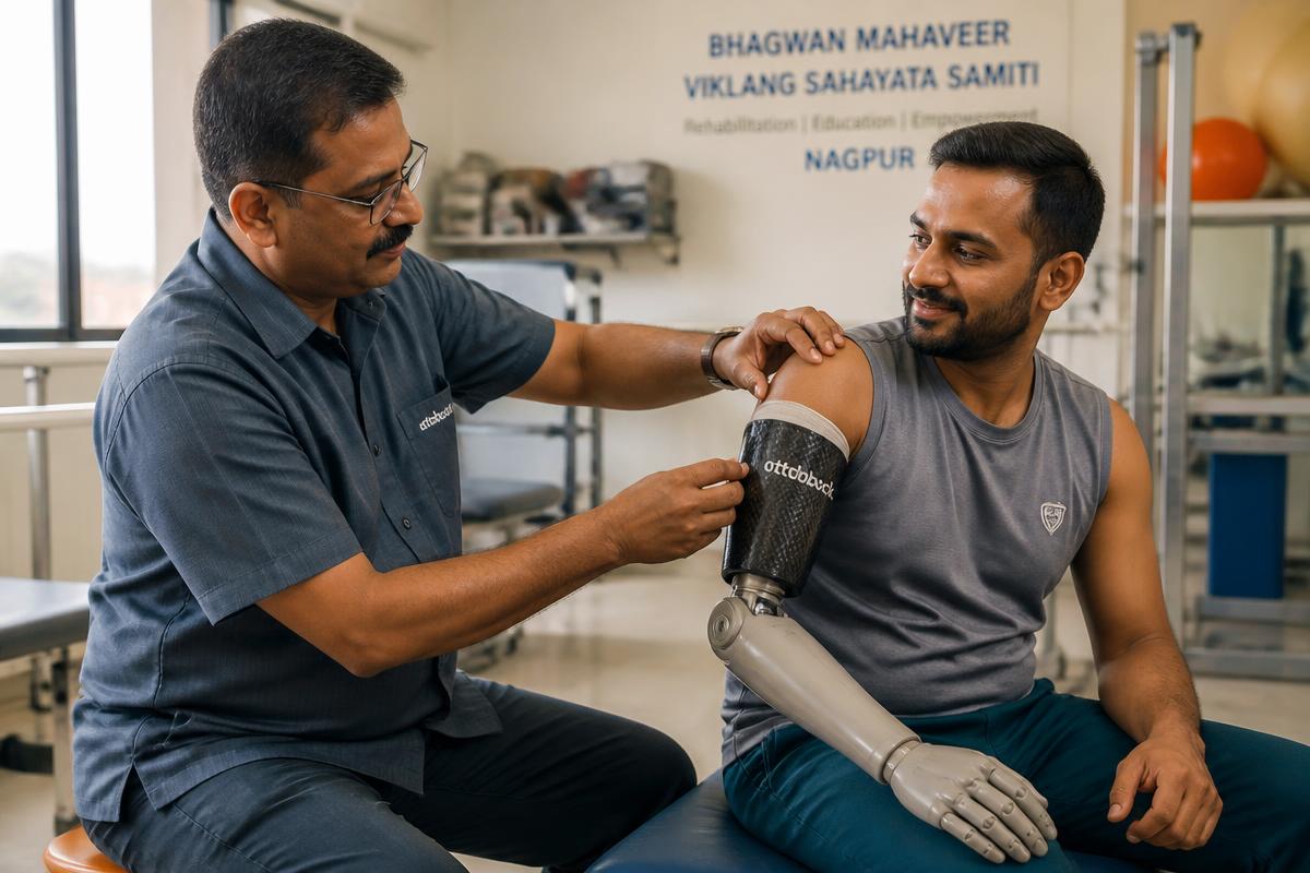 Prosthetist fitting a modern myoelectric upper-limb prosthesis for a patient at P & O Rehab Centre Nagpur